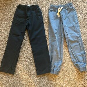 New, never worn. 2 pairs of dress pants - size 7/8